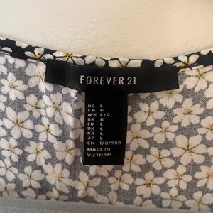 Black & yellow “daisy” flower dress. Forever 21